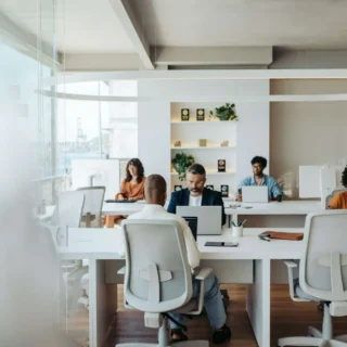 Multicultural colleagues working together in a creative coworking office
