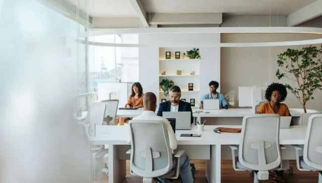 Multicultural colleagues working together in a creative coworking office