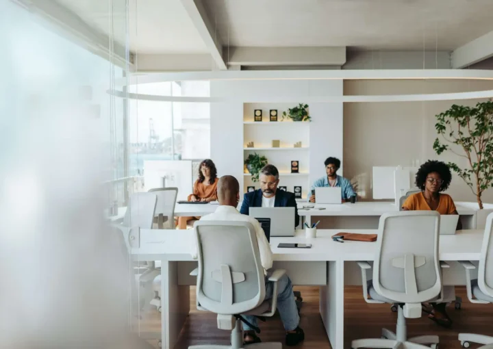 Multicultural colleagues working together in a creative coworking office