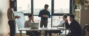 office collague thinking seriously in meeting room about data breach