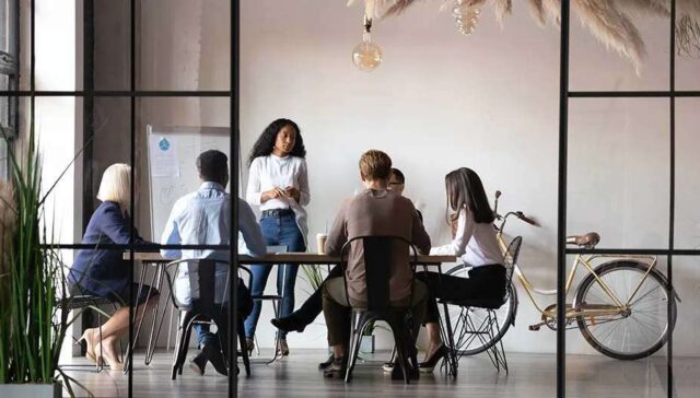 collague sitting together and disccuss on white board