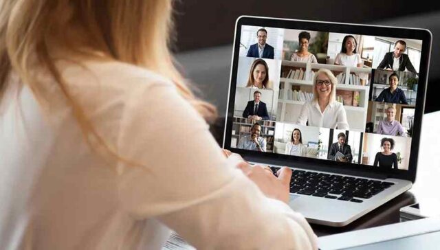 a women attending zoom call with their collague