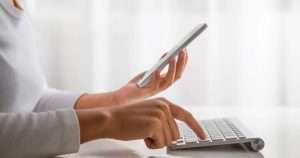 typing on keyword by one hand & other hand has a smartphone