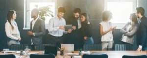 IT employees discussing serious, funny, important in one frame