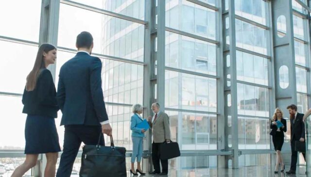 professional people walking in company walking space