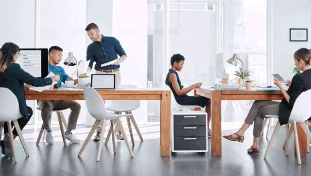 colleague working around the table