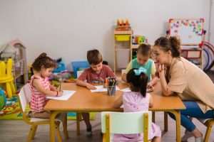Kids with teacher in day care