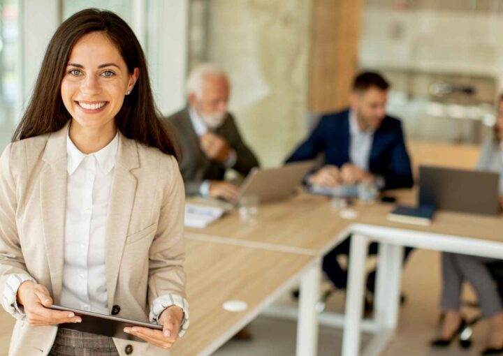 Young woman with digital tablet in the office