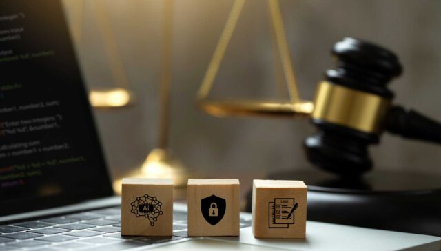 AI ethics and AI Law concept. wooden cube with AI icons on the laptop and a judicial gavel . artificial intelligence law and online technology of legal law regulations. AI technology group control .